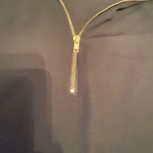 Black sleeveless blouse with Gold Zipper